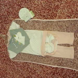 7 piece outfit. Girls 0-3 month. Brand Baby Kiss. Pink and white some Grey.